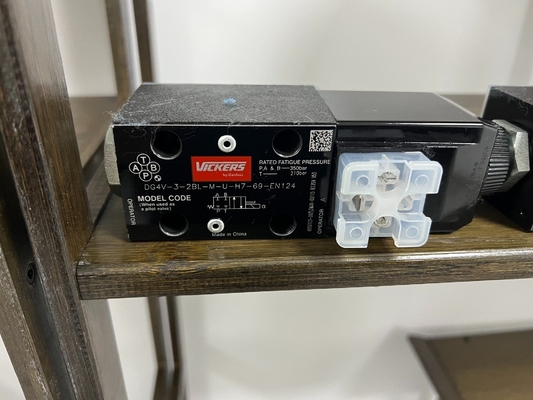 Одноместный Dg4V-3-6c-M -U-H5-60 Соленоидный клапан Пакет Размер 12.00cm * 10.00cm * 9.00cm
